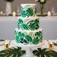 Tropical Luxe Cake stencil applied to a white, multi-tiered cake