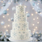 White cake stenciled with the snowflakes cake stencil 