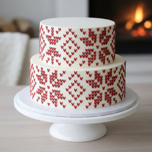 Snowflake Sweater Print stenciled onto the sides of a holiday party cake