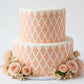 Patterned design with geometric shapes in peach color on a white background