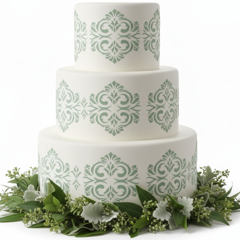Victorian Border Cake Stencil applied to a multi-tiered cake