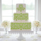 Hillsborough Damask Cake Stencil applied to a square, multi-tiered cake