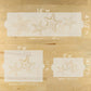 Starfish-themed stencils with measurements on a wooden surface