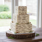 Birch wood pattern stenciled onto a cake for woodland 