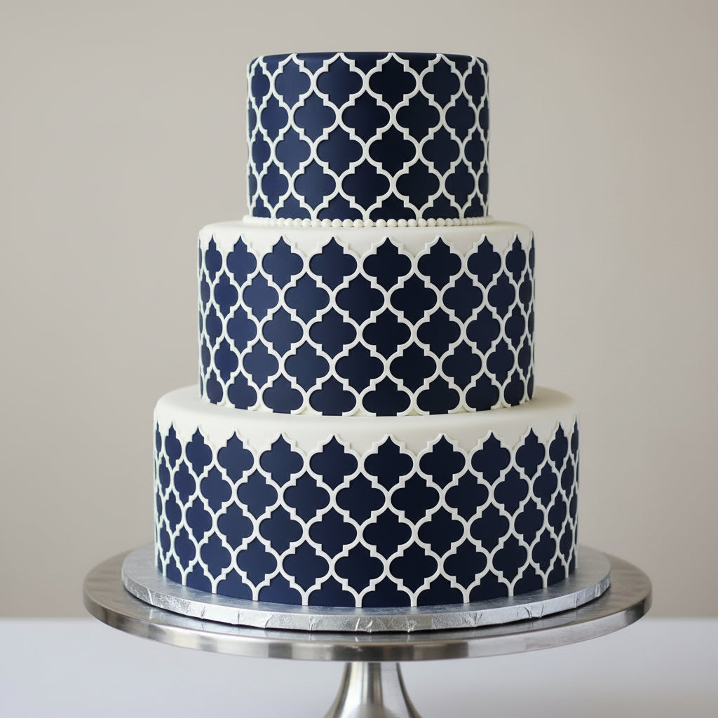 Agadir Cake Stencil applied to the sides of a multi-tiered cake.