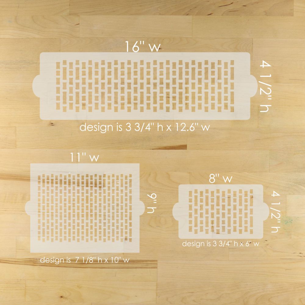 Three decorative stencils with measurements on a wooden surface