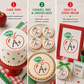 Collection of apple-themed back to school products including a cake, cookies, pies, cheesecakes, and event decor with 'A+' design.