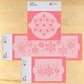 Snowflake Garland three-piece cake stencil set with two hanging ornament side designs and one geometric snowflake cake-top design.