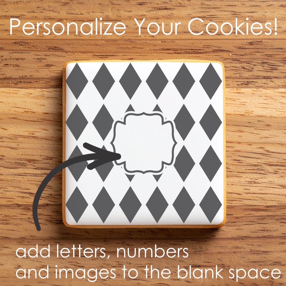 Cookie with black and white diamond pattern and blank space for customization on a wooden surface.