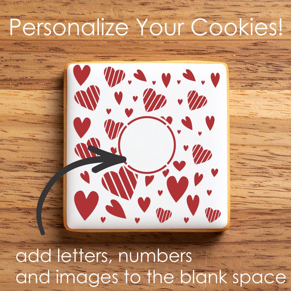 Cookie with red heart pattern on a wooden surface, promoting customization.