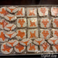 Graduation cookies by Crystal Diep using Texas Longhorn cookie stencils from Confection Couture 
