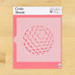 Cookie stencil with circular pattern on a pink sheet, branded 'Cookie Stencils' by 'Confection Couture'.