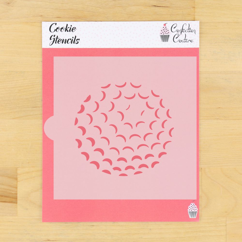 Cookie stencil with circular pattern on a pink sheet, branded 'Cookie Stencils' by 'Confection Couture'.