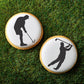 Male Golfer Cookie Stencil applied to white iced round cookies.