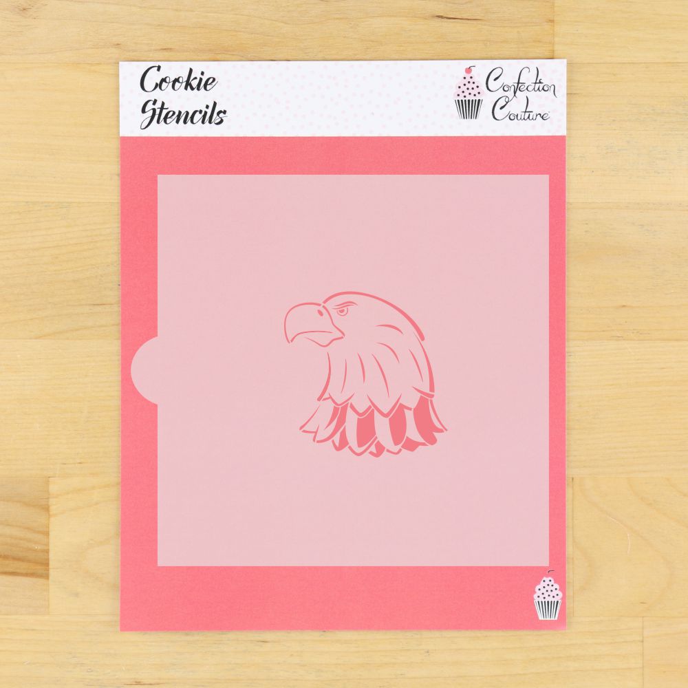 Eagle head mascot cookie stencil on pink background for decorating cookies at sports events.