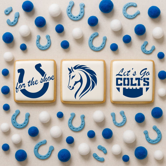 Decorative cookies with Colts-themed designs and blue and white candy on a beige background