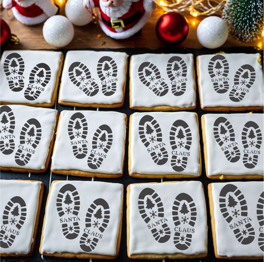 Cookies with Santa Claus footprints and 'Santa Claus' text on a festive background with Christmas decorations.
