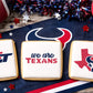Three Square iced cookies stenciled with the Houston Texans Football Stencil Set.