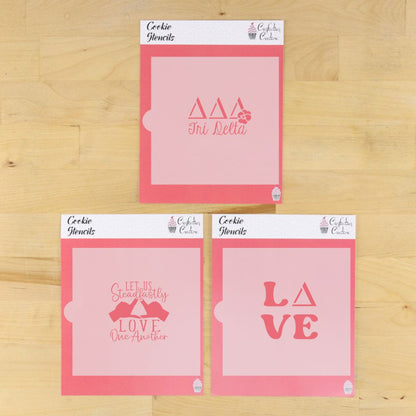 Delta Delta Delta cookie stencil set featuring Tri Delta lettering, Love design, and Let Us Steadfastly Love One Another design.