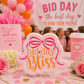 Decorated Bid Day Bliss sugar cookie displayed at a sorority Bid Day celebration with pink party décor, flowers, balloons, and sisterhood decorations.