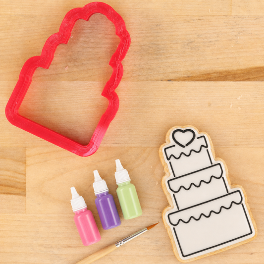 Cake Paint Your Own Cookie Next to the matching Cake Shaped Cookie Cutter