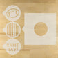 Gameday round stencils and the round cookie stencil adapter on a wooden surface