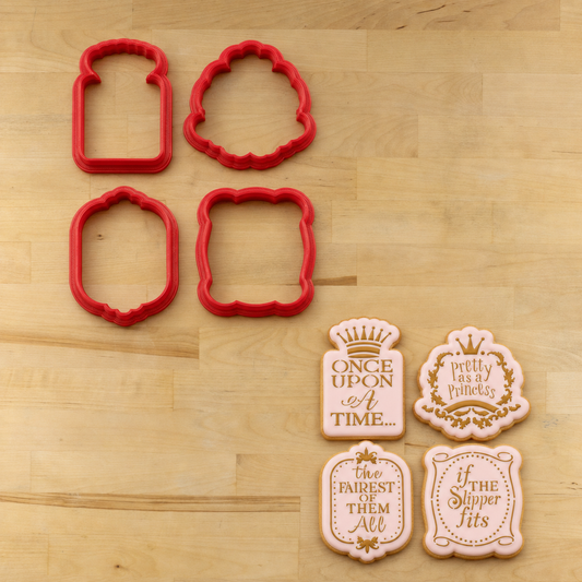 Princess cookie cutters next to four iced cookies that have been stenciled with the princess cookie stencils.