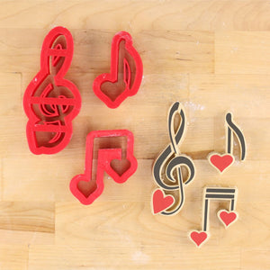 Valentine music notes cookie stencils in red and black, perfect for creating musical themed treats.