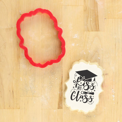 Mockup of the Kiss My Class Graduation Cookie Stencil on the Harlow Cookie Cutter