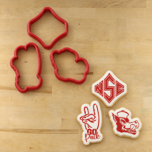 Go Pack Go Cookie Cutters and cookies decorated with the matching Go Pack Go Cookie Stencil Set 