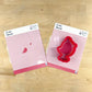 Easter Chick cookie stencil and matching cookie cutter on a wooden surface for fun baking.