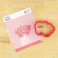 St. Patrick's Day sunglasses cookie stencil with 'Lucky' design and matching red cookie cutter.