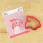 Wildcat Mascot Cookie Stencil with matching red cookie cutter for themed treats and celebrations.
