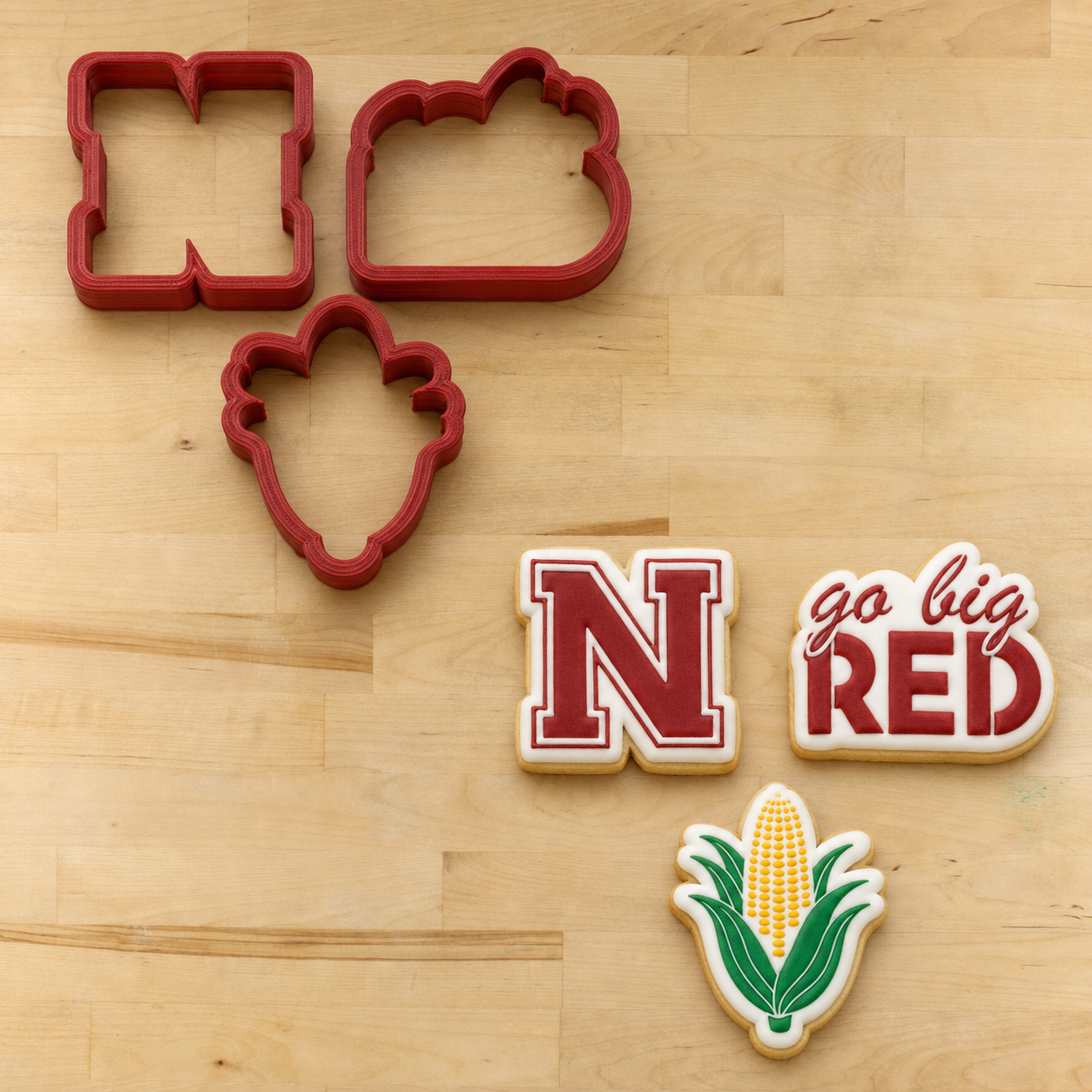 Big Red Nebraska Cornhuskers Cookie Cutter Set next to its matching cookies