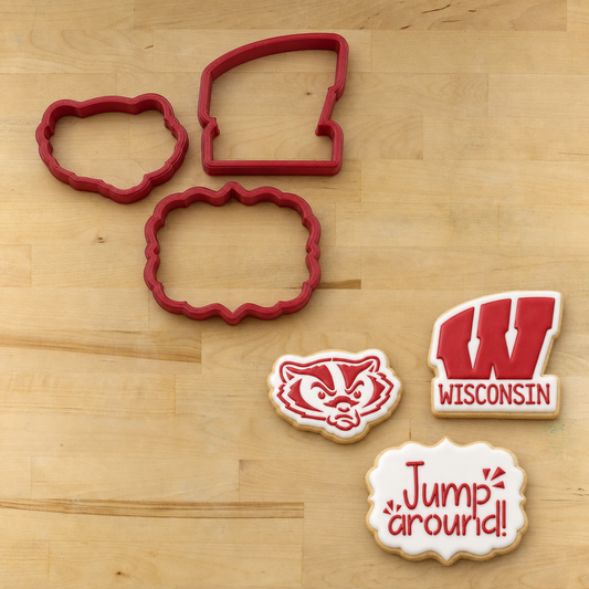 Wisconsin Badgers Cookie Stencil Set with a mockup of the matching cookie cutters on a wooden table
