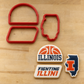Fighting Illini Cookie Cutters and three Illinois Basketball Cookies, decorated with the Fighting Illini Cookie Stencil Set