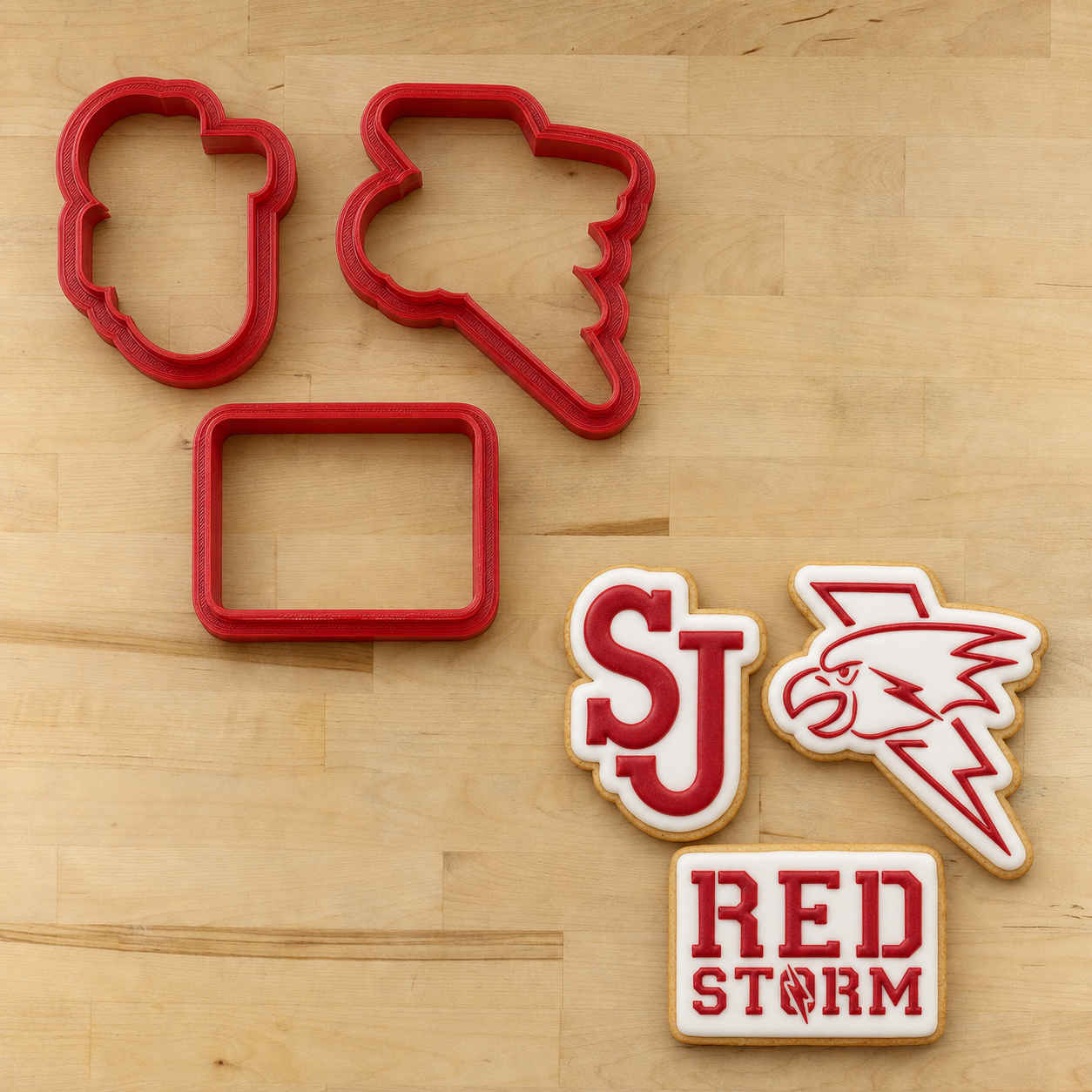St. John's "Red Storm" Theme Cookie Cutters next to their matching cookies.