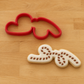 A 3D Printed cookie cutter shaped like a lasso rope and a decorated cookie using the lasso rope cookie stencil