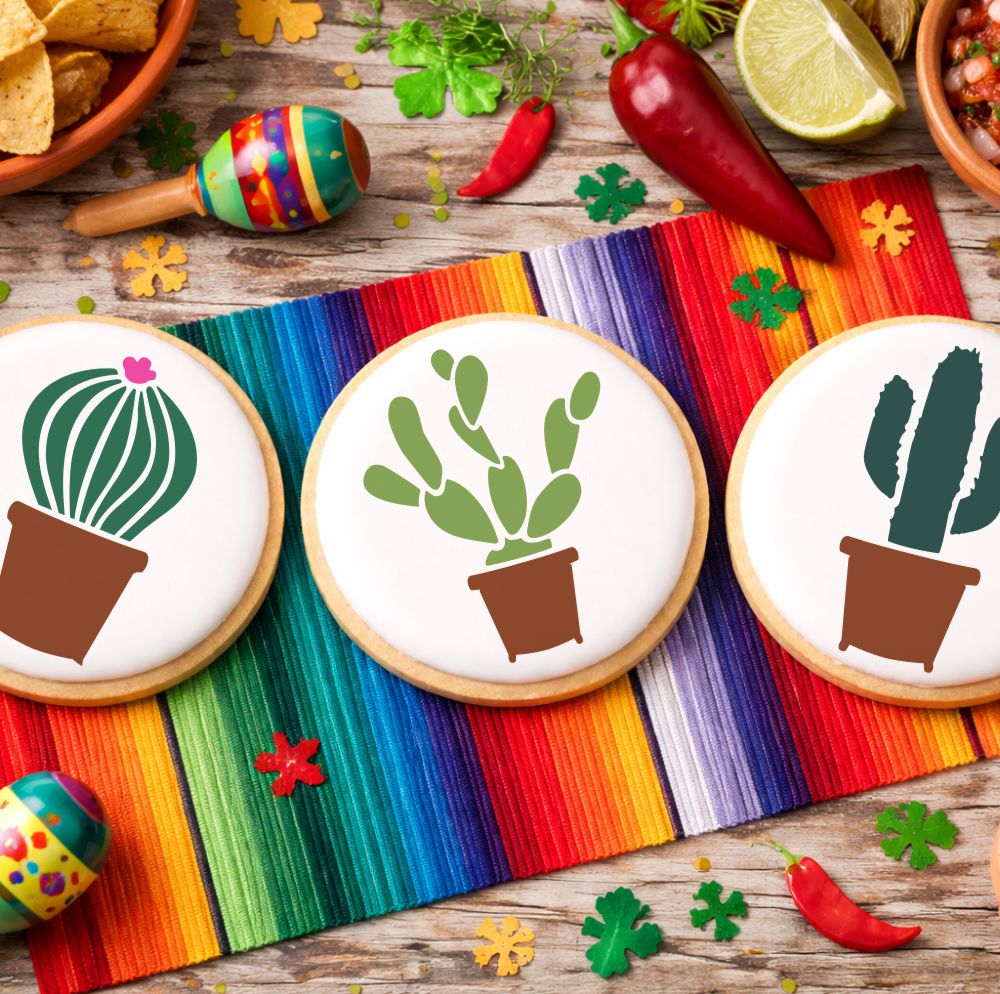 Cactus Round Cookie Stencil Set by Designer Stencils applied to three white iced cookies.