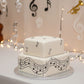 Musical Notes Cake Side Stencil applied to the sides of a white, square cake.