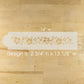 Hibiscus design stencil on a wooden surface with measurements