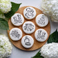 Wedding Round Cookies with stencils applied to the top.