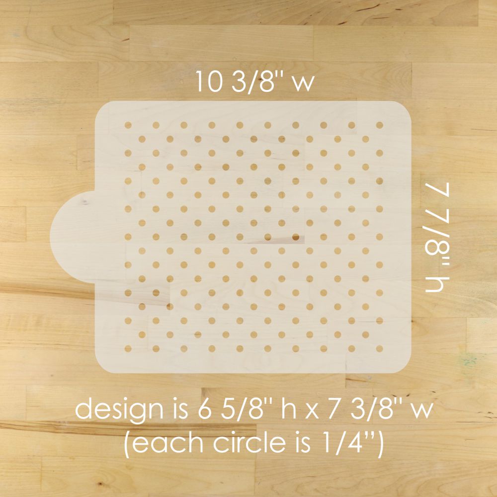 Measurement chart of a white mat with gold circles on a wooden surface