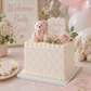 Lattice cake stencil applied to the sides of a bridal shower cake for a baby girl