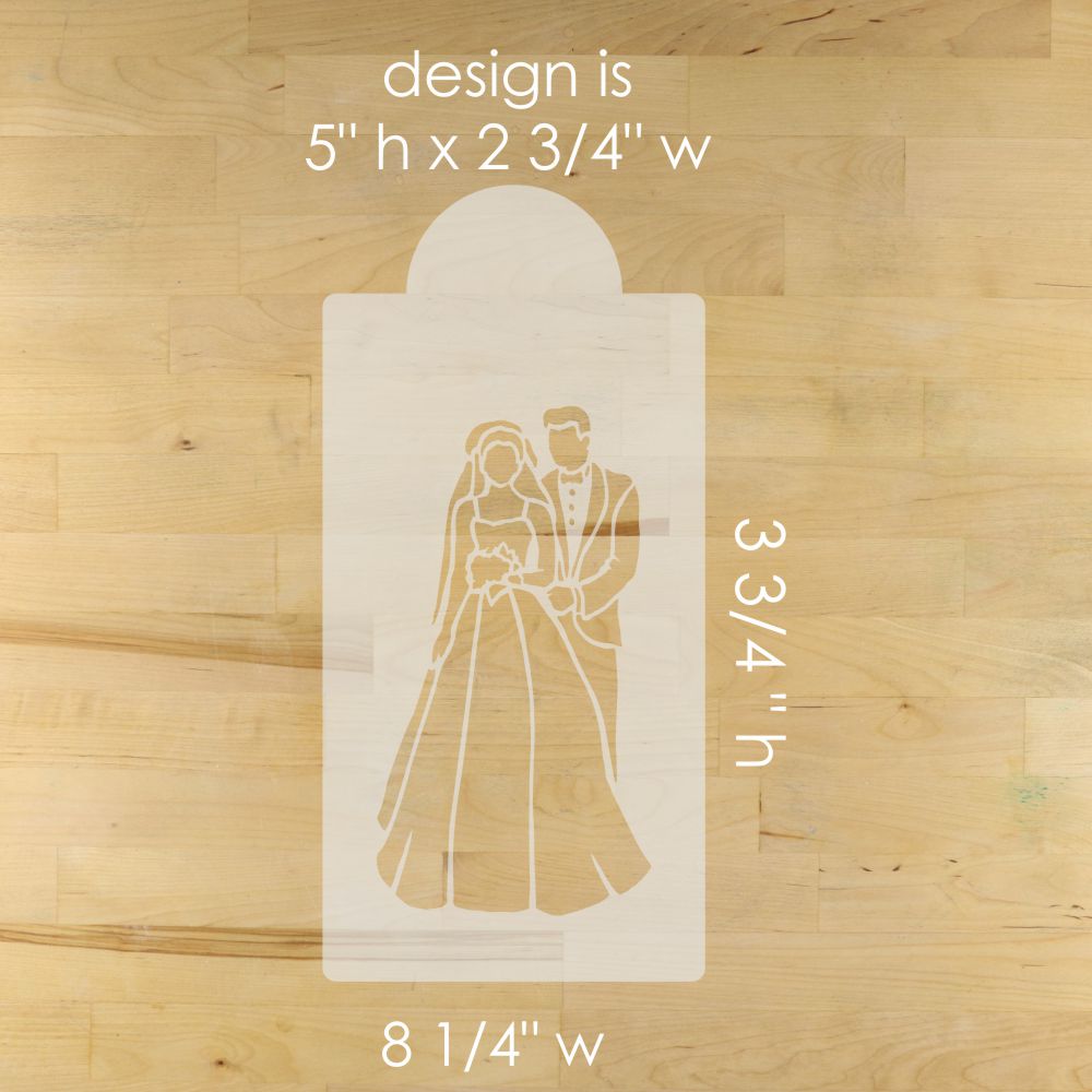 Wooden cutout of a bride and groom with measurements on a wooden surface