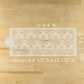 Decorative stencil with measurements on a wooden surface