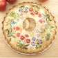 Spring Garden Cake Stencil painted onto the top of an apple pie