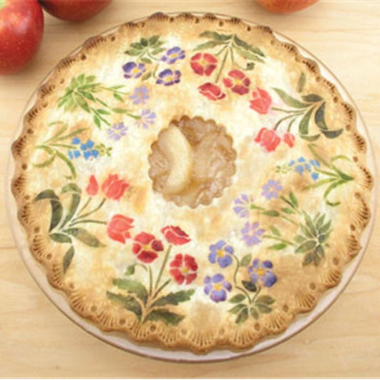 Spring Garden Cake Stencil painted onto the top of an apple pie