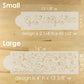 Two decorative stencils with measurements on a wooden surface