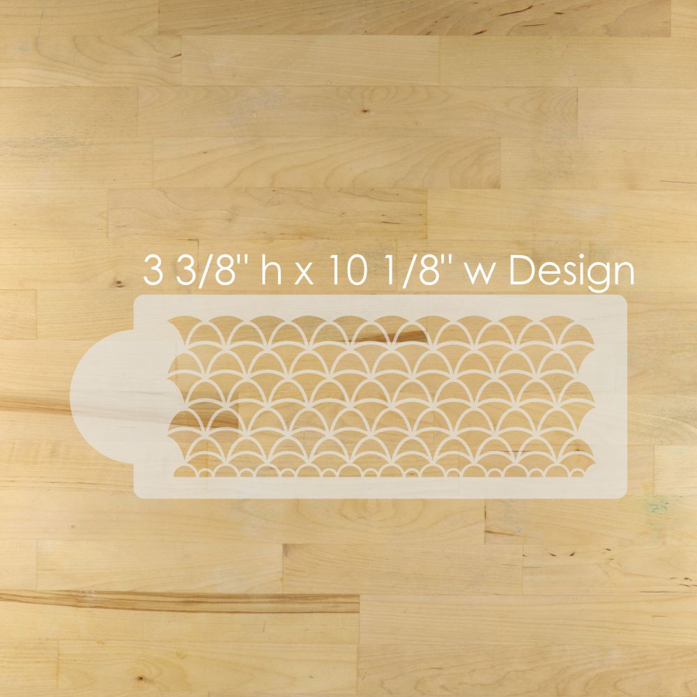 Decorative stencils with a geometric pattern on a wooden surface